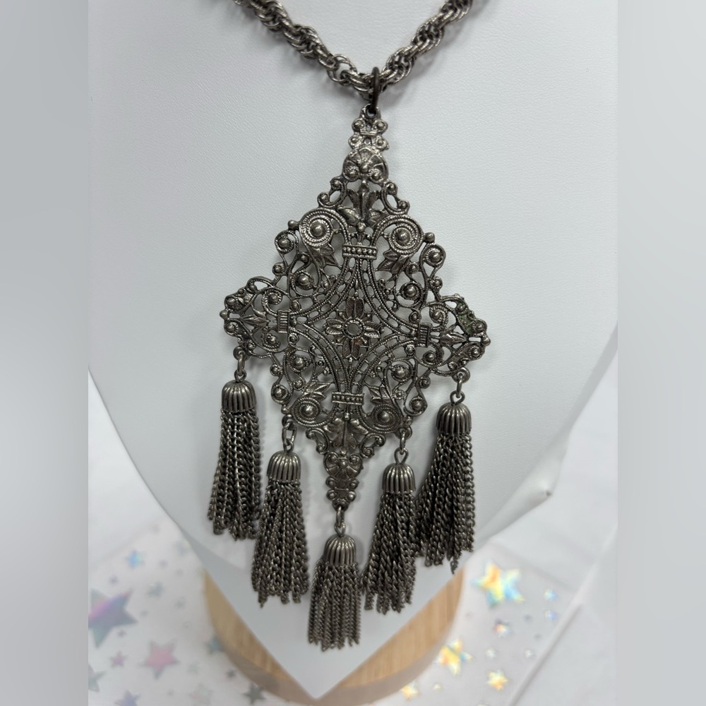 Bold silver necklace with tassels